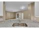 Charming kitchen with granite countertops, stainless steel sink, open to living space, seamlessly connecting cooking and relaxation at 5512 Metrowest Blvd # 201, Orlando, FL 32811