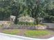 Stonebridge Place community entrance sign surrounded by lush landscaping at 6100 Stevenson Dr # 207, Orlando, FL 32835