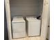 Laundry closet with a stacked washer and dryer at 6100 Stevenson Dr # 207, Orlando, FL 32835
