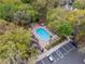 Aerial view of the apartment complex with community pool, parking, and green space at 685 Youngstown Pkwy # 300, Altamonte Springs, FL 32714