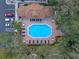 Aerial view of pool and community amenities surrounded by mature trees at 685 Youngstown Pkwy # 300, Altamonte Springs, FL 32714
