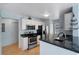 Efficient kitchen layout with stainless steel appliances, granite countertops and white cabinetry at 685 Youngstown Pkwy # 300, Altamonte Springs, FL 32714