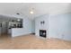 Light-filled living room with an open layout and fireplace, connected to the kitchen at 685 Youngstown Pkwy # 300, Altamonte Springs, FL 32714