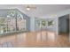 Spacious living room featuring a high ceiling and ample natural light from large windows at 685 Youngstown Pkwy # 300, Altamonte Springs, FL 32714