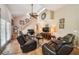 Inviting living room with comfortable seating, staircase, and tasteful décor at 742 Seneca Trl, St Cloud, FL 34772