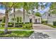 Charming single-story home with a well-manicured lawn and inviting curb appeal and paver driveway at 7834 Minutemen Loop, Winter Garden, FL 34787