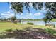 Scenic lake view with dock and benches to sit and enjoy at 8865 Se 119Th St, Summerfield, FL 34491