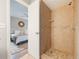 Bathroom shower with a view into the main bedroom area at 9494 Lake Lotta Cir, Gotha, FL 34734
