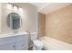 Bathroom featuring tile accents, vanity, and combination bath and shower at 9494 Lake Lotta Cir, Gotha, FL 34734