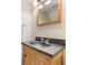 Bathroom with a unique sink and vanity combination under modern lighting, creating a stylish space at 9494 Lake Lotta Cir, Gotha, FL 34734