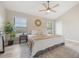 Comfortable bedroom with natural light and a neutral color palette at 9494 Lake Lotta Cir, Gotha, FL 34734