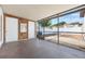Screened patio with view of the fenced backyard at 9494 Lake Lotta Cir, Gotha, FL 34734
