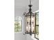 Elegant foyer showcases a decorative chandelier and abundant natural light from large windows at 1041 Castle Pines Ct, Reunion, FL 34747