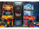 The Arcade offers dart boards and motorcycle arcade games, creating an engaging entertainment space at 1041 Castle Pines Ct, Reunion, FL 34747