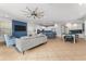 Open-concept living area flows into a modern kitchen with a dining area and comfortable seating at 1041 Castle Pines Ct, Reunion, FL 34747