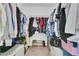 Spacious walk-in closet with ample storage and custom shelving at 10656 Savannah Plantation Ct, Orlando, FL 32832