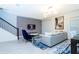 Modern living room with stylish furniture, a large TV, and elegant decor at 1070 Splash Shot Pl, Davenport, FL 33896