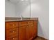 Well-appointed bathroom featuring a stylish vanity with granite countertop and ample storage at 150 E Robinson St # 1023, Orlando, FL 32801