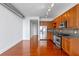 Modern kitchen features stainless steel appliances, granite countertops, and tile backsplash at 150 E Robinson St # 1023, Orlando, FL 32801