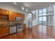 Modern kitchen features stainless steel appliances, granite countertops, and tile backsplash at 150 E Robinson St # 1023, Orlando, FL 32801