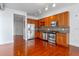 Modern kitchen features stainless steel appliances, granite countertops, and tile backsplash at 150 E Robinson St # 1023, Orlando, FL 32801