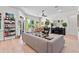 Inviting living room with stylish furnishings, lots of natural light, and an adjacent dining area at 1536 Pine Island Rd, Kissimmee, FL 34744