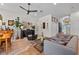 Open concept living space with modern decor, comfortable seating, and lots of natural light at 1536 Pine Island Rd, Kissimmee, FL 34744