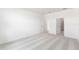 Spacious carpeted bedroom with neutral walls and ample natural light from large windows at 1568 Gardiner St, Haines City, FL 33844