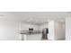 Modern kitchen with stainless steel appliances, granite counters, white cabinets, and a central island at 1568 Gardiner St, Haines City, FL 33844