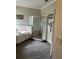 A Primary bath featuring a glass-enclosed shower and garden tub at 160 Calabay Parc Blvd, Davenport, FL 33897