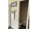 Bathroom with stand up shower, toilet, and towel rack with towels at 160 Calabay Parc Blvd, Davenport, FL 33897