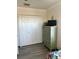 Bedroom featuring hardwood floors, a closet, and TV on a drawer cabinet at 160 Calabay Parc Blvd, Davenport, FL 33897