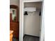 Walk-in closet featuring built-in shelving, and ample storage space, adjacent to bedroom at 160 Calabay Parc Blvd, Davenport, FL 33897