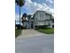 Stunning two-story home with meticulously maintained landscaping and a large driveway at 160 Calabay Parc Blvd, Davenport, FL 33897
