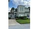 Stunning two-story home with meticulously maintained landscaping and a large driveway at 160 Calabay Parc Blvd, Davenport, FL 33897