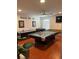 Spacious game room with a pool table, foosball table, and ample space for entertainment at 160 Calabay Parc Blvd, Davenport, FL 33897