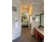 Hallway leading to bedroom has a convenient make up vanity at 160 Calabay Parc Blvd, Davenport, FL 33897