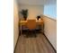 Small office space with a wooden desk, chair, and decor, perfect for a home office at 160 Calabay Parc Blvd, Davenport, FL 33897