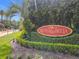 The Riviera Bella community sign is surrounded by lush landscaping offering a welcoming entrance to the neighborhood at 169 Verde Way, Debary, FL 32713
