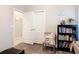 Office featuring a chair, bookcase, and light walls, creating a functional and stylish workspace at 169 Verde Way, Debary, FL 32713