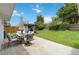 The backyard has a patio with an outdoor table and a storage shed at 176 Hidden View Dr, Groveland, FL 34736