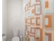 Bathroom featuring a toilet and shower with a decorative shower curtain at 1787 White Feather Loop, Oakland, FL 34787