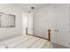 Bright bedroom with a four poster bed, double mirrored closet doors and an open door to the ensuite bathroom at 1787 White Feather Loop, Oakland, FL 34787
