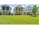 Charming two story homes with manicured lawn and second story balconies at 1787 White Feather Loop, Oakland, FL 34787