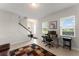 Inviting living space with a staircase, adjacent to a home office at 1787 White Feather Loop, Oakland, FL 34787