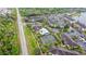 Aerial view of community featuring a pool, tennis court, and well-maintained landscaping at 1910 Summer Club Dr # 108, Oviedo, FL 32765