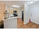 Efficient kitchen layout with modern black appliances and ample counter space at 1910 Summer Club Dr # 108, Oviedo, FL 32765
