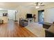 Spacious living area with plush seating, a flat-screen TV, and access to the outdoor balcony at 1910 Summer Club Dr # 108, Oviedo, FL 32765