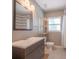 Bright bathroom featuring a modern vanity, updated fixtures, and a tiled shower at 2100 Forest Cir, Orlando, FL 32803