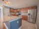 Updated kitchen featuring granite countertops, stainless steel appliances, and ample cabinet space at 2100 Forest Cir, Orlando, FL 32803